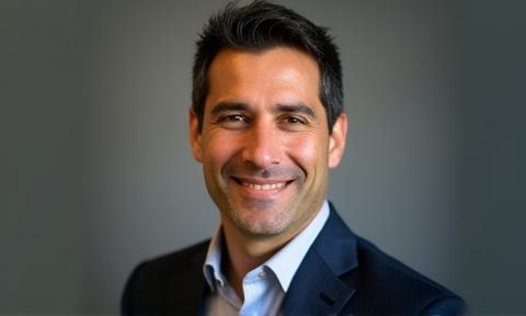 Professional headshot of David Ramirez, CEO of ApexComms.